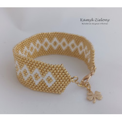 Złota bransoletka z koniczynką