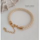 Komplet naszyjnik z opaską i bransoletka - beżowo-złoty